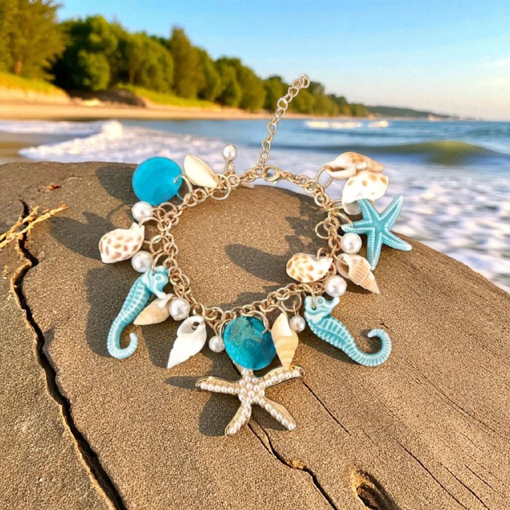 Ocean-Themed Charm Bracelet with Blue and Gold Color Accents
